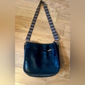 Elegant Black Shoulder Bag with Striped Strap